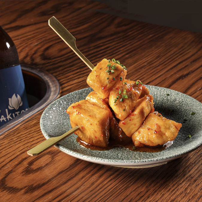 Crispy fried chicken<br>Yakitori with sweet and sour cañí sauce